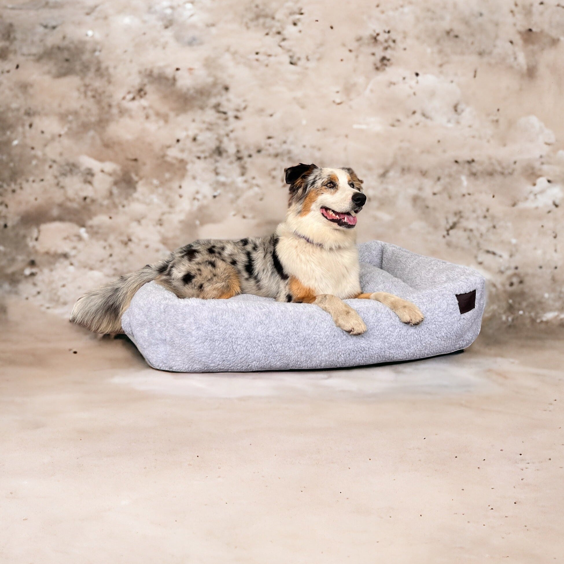 Cama para perro tipo peluche gris